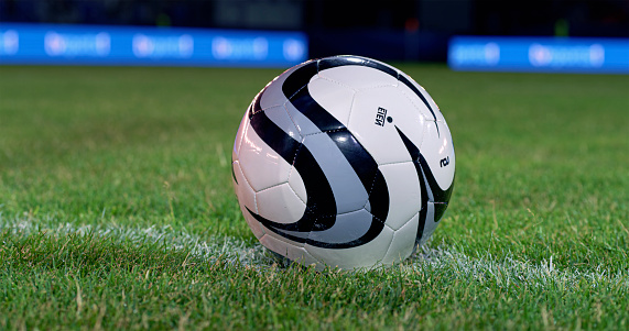 Ball for American football on a black background. USA game. Copy space.