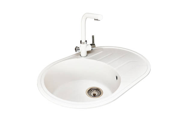 istock Light grey stone sink and faucet double tap mixer for insert into modern contemporary kitchen countertop isolated on white mockup. 2101656994