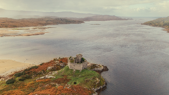 Castle Tioram is a significant historical site located on the tidal island Eilean Tioram in Loch Moidart, Lochaber, Highland, Scotland. It is known for its picturesque ruins that date back to the medieval period and its strategic position controlling access to Loch Shiel.