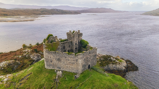 Castle Tioram is a significant historical site located on the tidal island Eilean Tioram in Loch Moidart, Lochaber, Highland, Scotland. It is known for its picturesque ruins that date back to the medieval period and its strategic position controlling access to Loch Shiel.