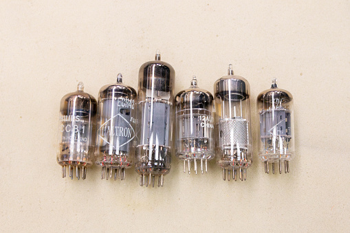 Radio repair store, The Hague, the Netherlands - February 17 2024: old Philips radio tube vacuum valves on a light background