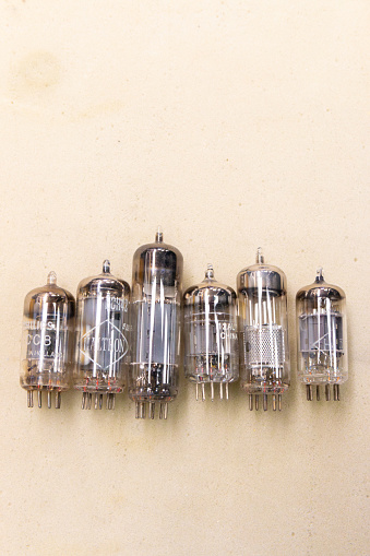 Radio repair store, The Hague, the Netherlands - February 17 2024: old Philips radio tube vacuum valves on a light background