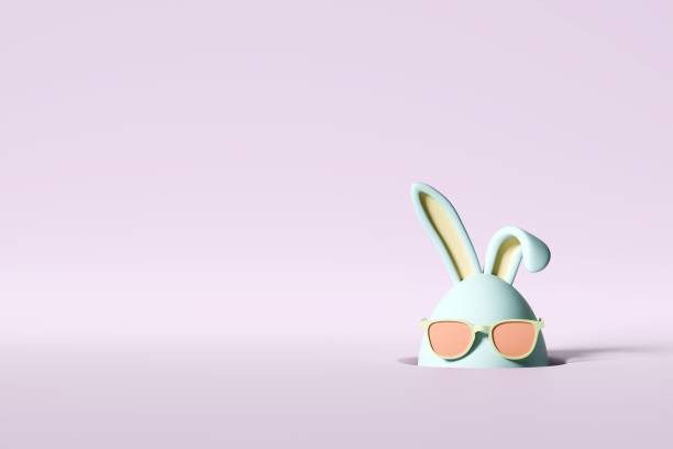 istock Happy Easter day. Stylish Easter bunny in form egg with sunglasses looking out its burrow. 3d illustration, rendering. Background for greeting card, spring postcard, flyer, advertising. Copy space 2101751892