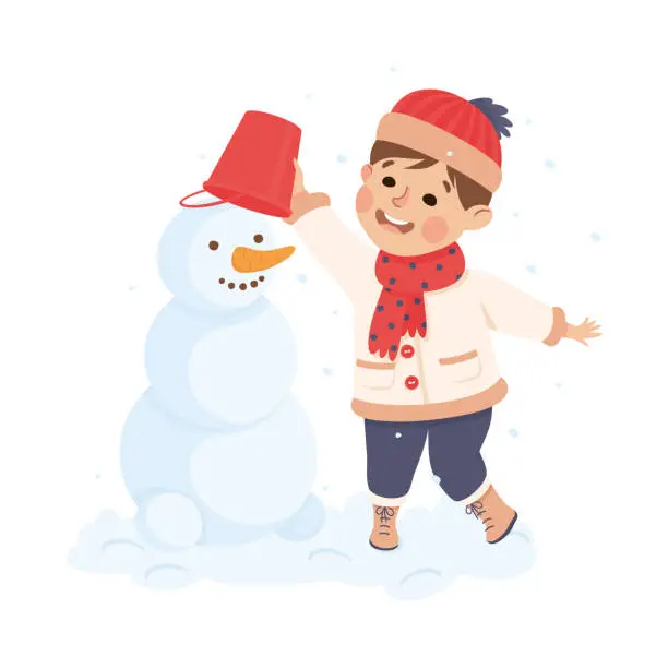 Vector illustration of Adorable little boy making snowman. Happy kid playing outdoors cartoon vector illustration