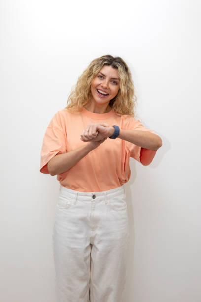 istock Professional woman with a raised smart watch 2101763159