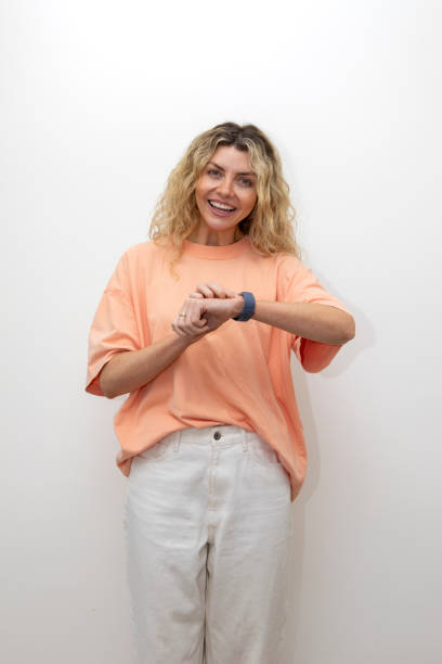 istock Professional woman with a raised smart watch 2101763160