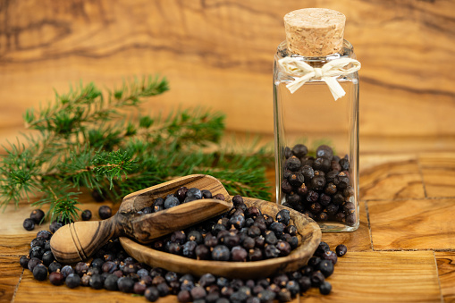 Olives and bottle with olive oil.