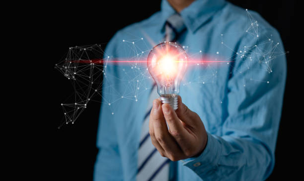 istock Creative thinking ideas and innovation technology,inspiration concept. Businessman holding a light bulb and imagination,Solution analysis and development network connection. 2101834227