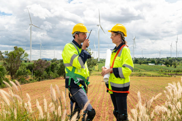 istock Engineering people are meeting at electrical turbines field, Engineering people, corporate working, teamwork concept 2101880210