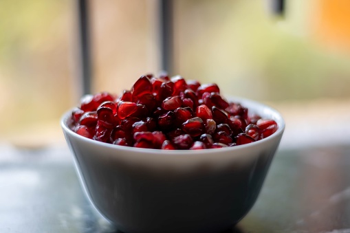 The pomegranate is a fruit-bearing deciduous shrub in the family Lythraceae, subfamily Punicoideae, that grows between 5 and 10 m tall.