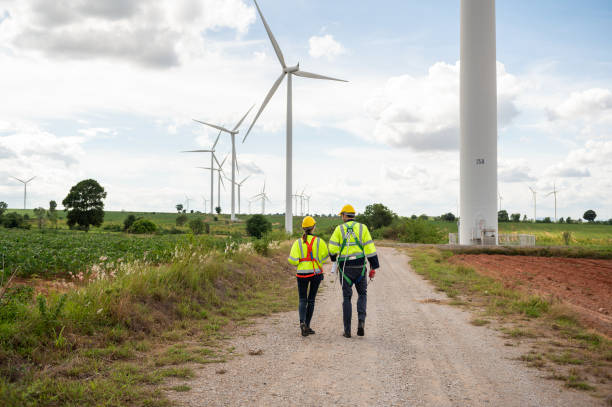 istock Engineering people are meeting at electrical turbines field, Engineering people, corporate working, teamwork concept 2101883527
