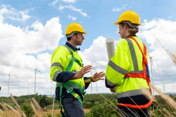 istock Engineering people are meeting at electrical turbines field, Engineering people, corporate working, teamwork concept 2101884983