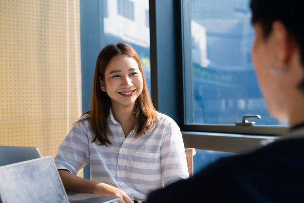 istock Asian colleague meeting in office 2101903775