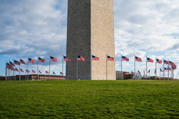 istock The Washington Monument surrounded by American flags 2101918185