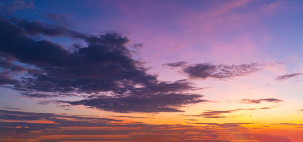 istock Morning clouds and sky,Panorama sunset sky and cloud background,Orange sky and clouds background,Background of colorful sky concept, amazing sunset with twilight sky and clouds 2101937771