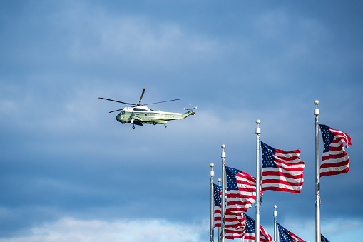When the President leaves Washington D.C., he takes the Marine One helicopter from the White House South Lawn to Andrews Air Force Base where his plane, Air Force One, is waiting.