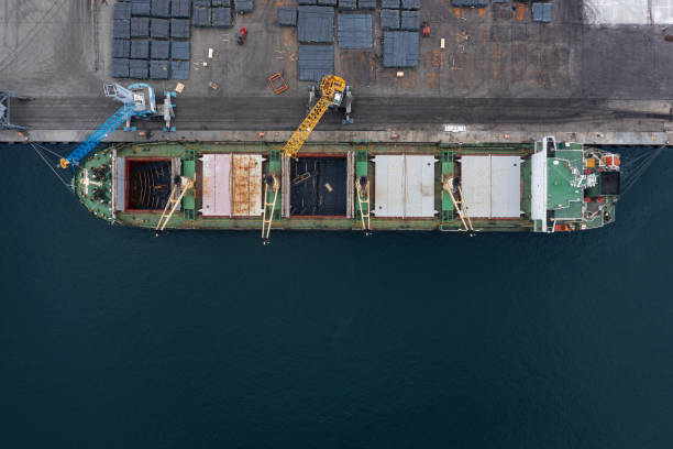 istock Aerial view to cargo ship on the port 2101982372