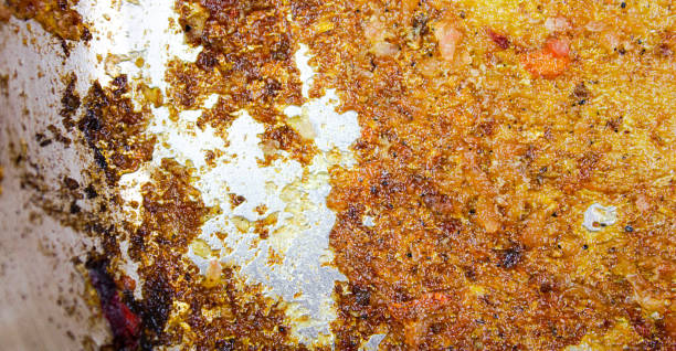 istock Dirty greasy pan surface. Burnt greasy food, dirty dishes, background. 2101984988