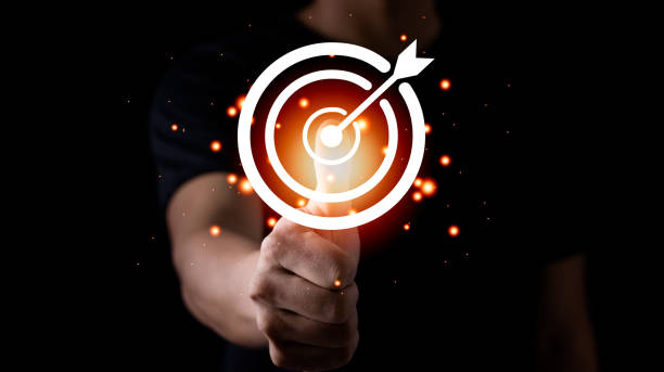 istock Businessman holding virtual dartboard and arrow with copy space for setup business objective target concept. 2101994428