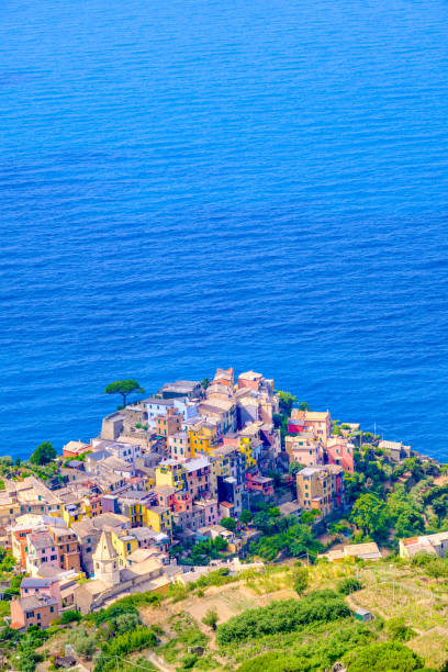 Corniglia, IT - 25 July 2023: Top view over Corniglia village in Cinque Terre