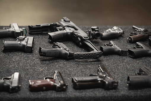 Pistols in a shooting range close-up. High quality photo