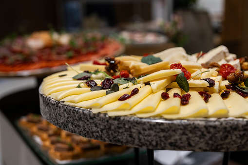 Slices of cheese on a buffet table