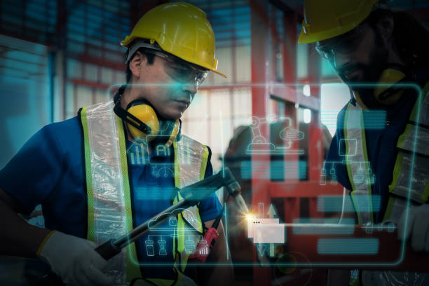 istock Team of engineers working at the factory 2102119634