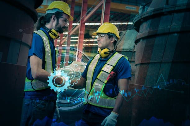 istock Team of engineers working at the factory 2102119644