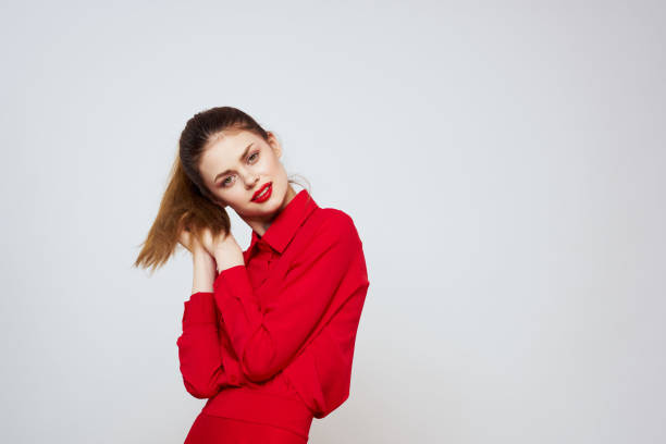 istock attractive woman with bright makeup and light background gesturing with hands cropped view emotion fun 2102126964