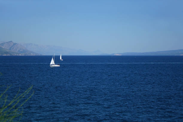 Sailing boat and beautiful Adriatic sea landscape in Croatia.