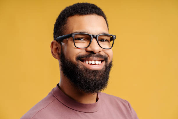 istock Authentic, bearded African American man, hipster wearing stylish eyeglasses looking at camera 2102173805