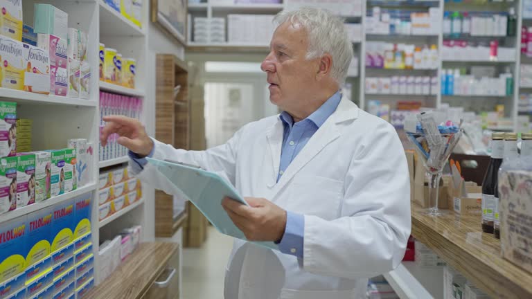 Male pharmacist working