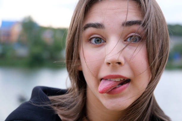 istock typical teenager girl mock gesture 2102217722