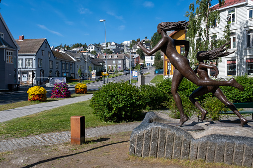 Tromso, Norway - 16 July 2023 : Sculptor Leonardo Lustig statue, Runners