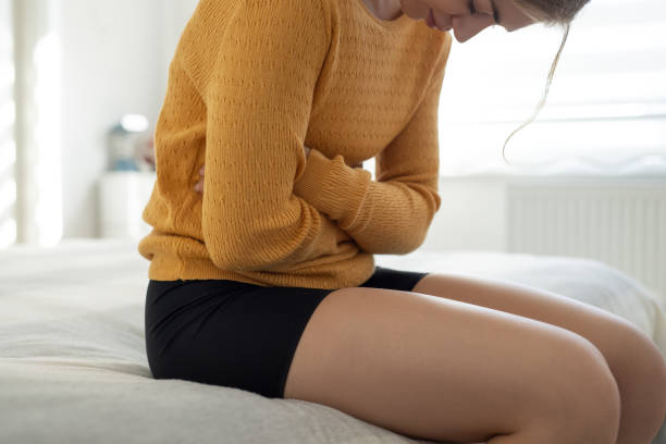 istock Woman with abdominal pain 2102289574