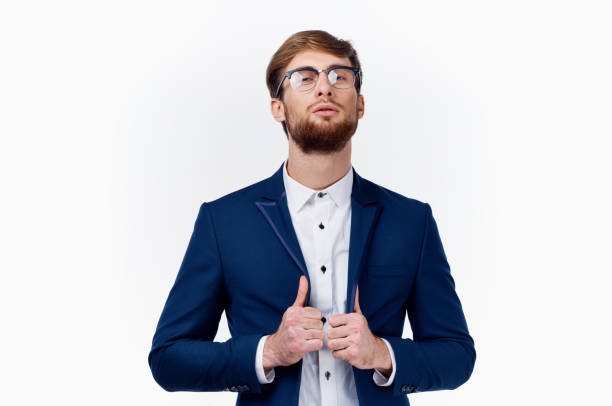 istock businessman in classic suit showing thumb up Success at work light background 2102299037