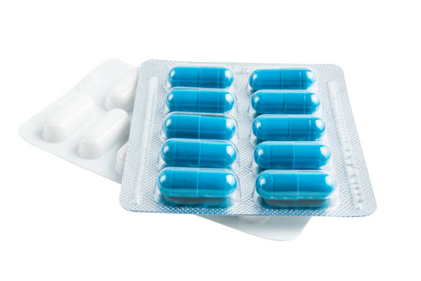 istock Various medicine capsules, pills and tablets in a blister pack isolated on white background, healthcare and medicine concept 2102305270