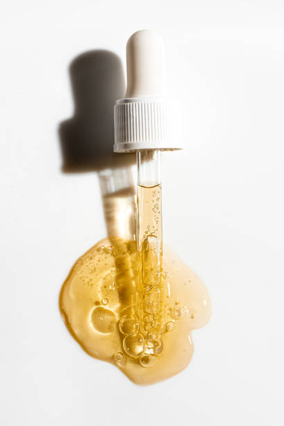 istock Dropper pipette and retinol face serum 2102362491