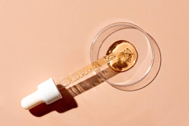 istock Dropper and petri dish with oil gel sample 2102364585