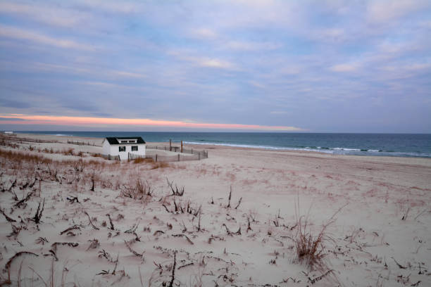 istock Solitude on a coastal beach at sunset 2102383035