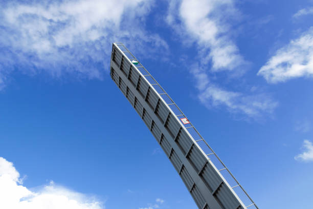 A drawbridge over the river against a blue sky. City infrastructure.