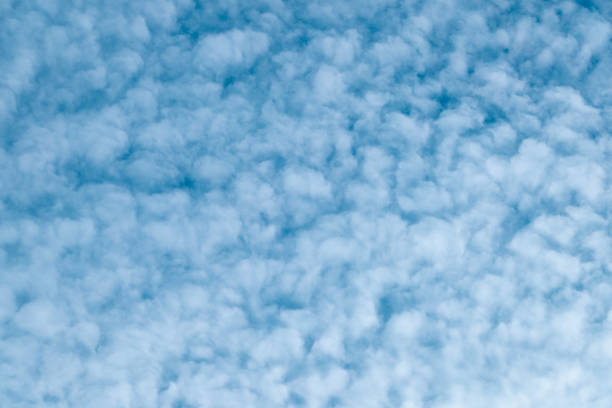 Blue sky and white clouds. Beautiful sky background. Heavenly landscape. Wallpaper.