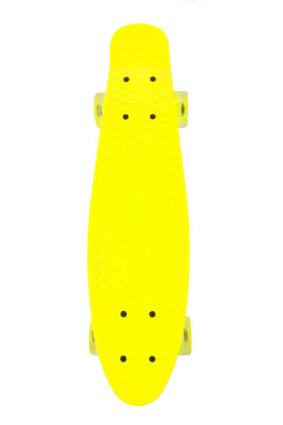 Yellow skateboard deck on white background stock photo
