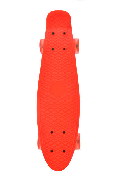 Red skateboard deck on white background stock photo