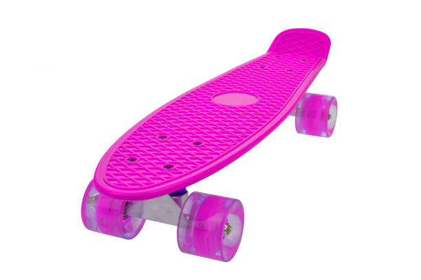 Pink skateboard deck on white background stock photo