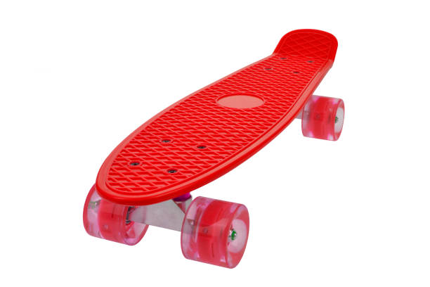 Red skateboard deck on white background stock photo
