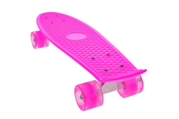 Pink skateboard deck on white background stock photo