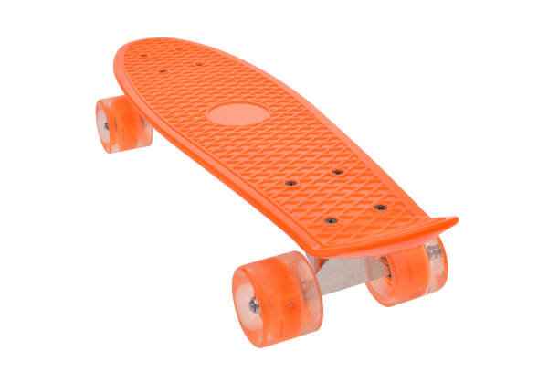 Orange skateboard deck on white background stock photo