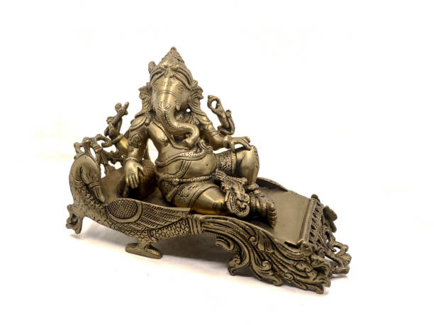 istock statue of elephant headed god lord ganesh sitting on a peacock throne 2102412779
