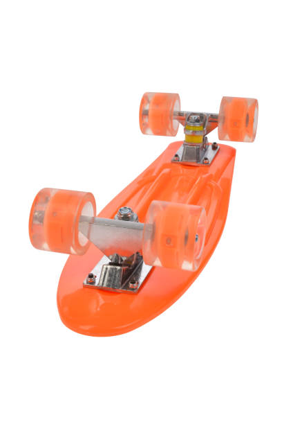 Orange skateboard deck on white background stock photo